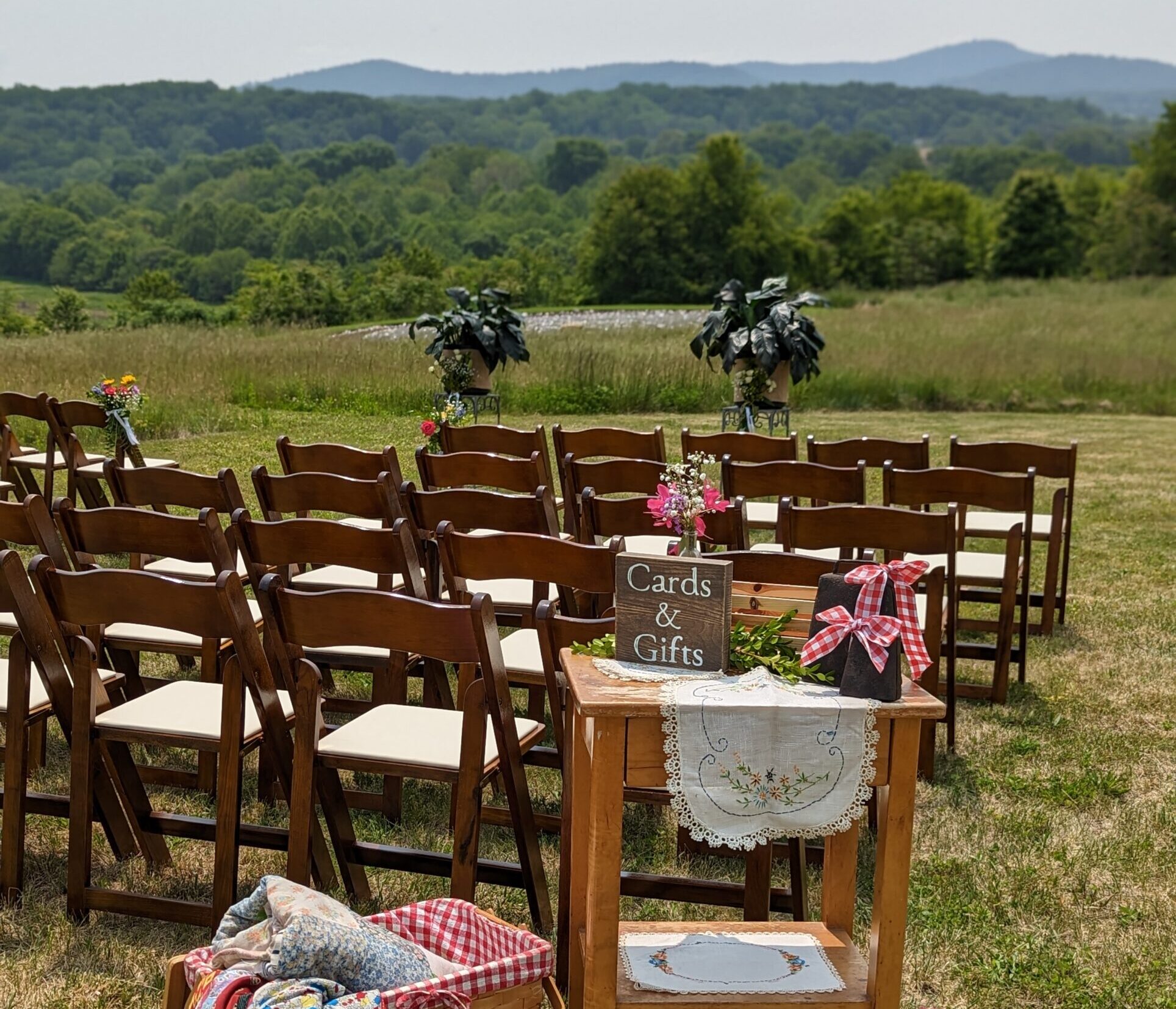 Whimsical.Micro.Wedding.Table.Portrait.1 A circular skylight with geometric design illuminates the space below, highlighting a religious artwork featuring detailed, vibrant imagery and inscriptions.